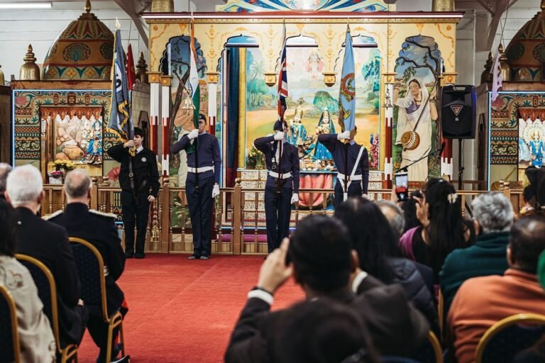 Cadets form the colour party inside the Mandir